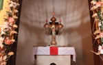 The altar at the Baptism Site, depicting an image of Jesus on the cross