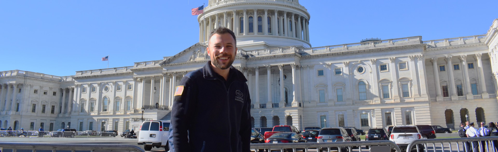 A HALO staff member stands outside The Whitehouse in the US