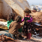 A family in a temporary housing camp