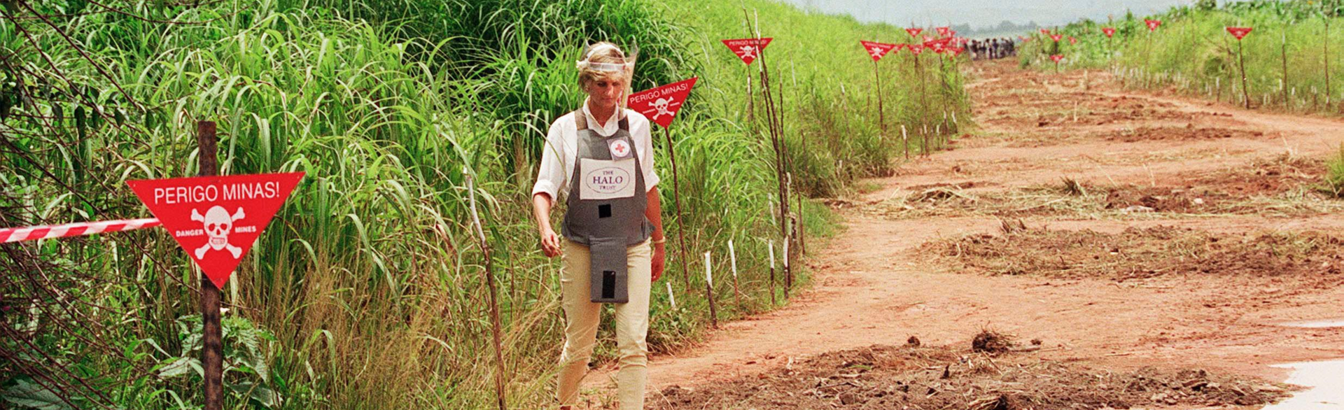 Princess Diana walking through a minefield in Huambo