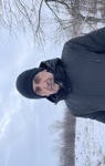 Валерій Миколайович на фоні засніженого поля