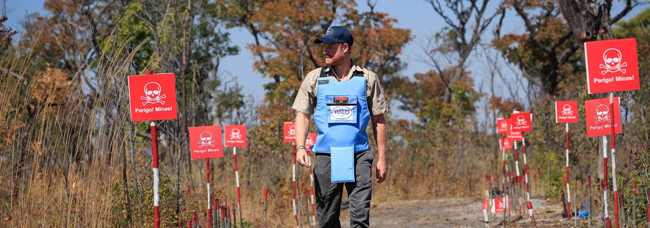 Duke of Sussex walking through a minefield in Angola
