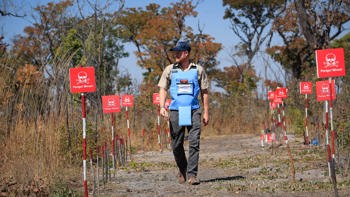 Duke of Sussex walking through a minefield in Angola
