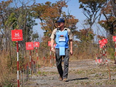 Duke of Sussex walking through a minefield in Angola