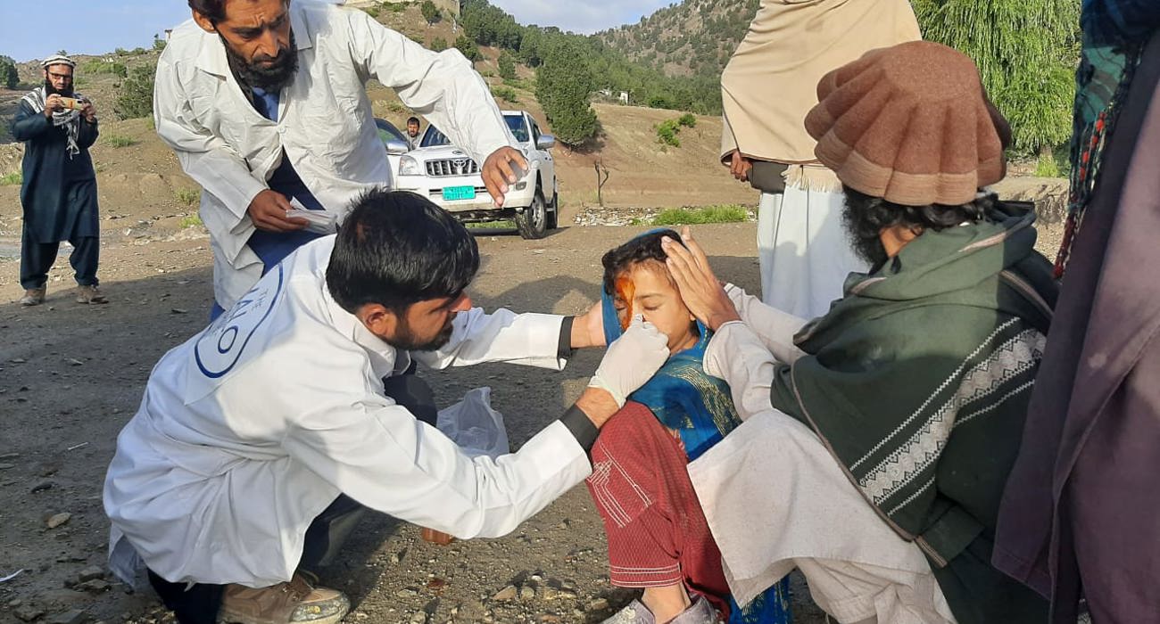 HALO medics treat an injured child after the Khost Earthquake