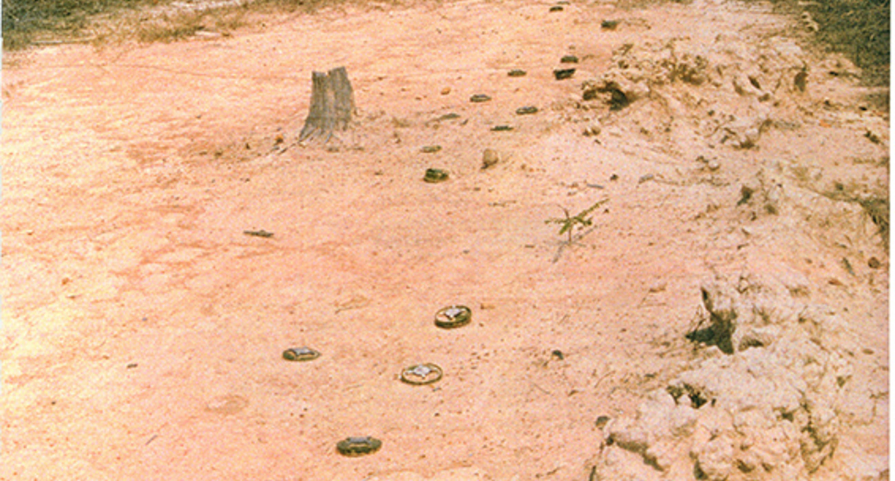 A dirt road in Cambodia heavily contaminated with mines 