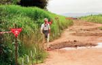 Princess Diana walking through a minefield in Angola in 1997