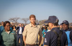 Senior HALO Trust Staff member, Tom Dibb, provides Prince Harry with a safety brief in Angola