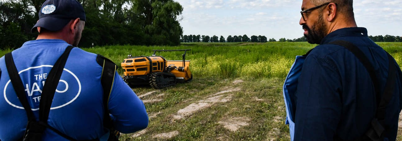Former Foreign Secretary, James Cleverly, watches a demonstration of a remote controlled vegetation cutter in a minefield in Ukraine