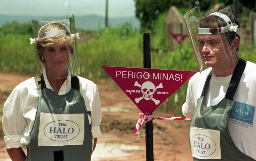 Princess Diana standing in a minefield with HALO staff in Angola in 1997