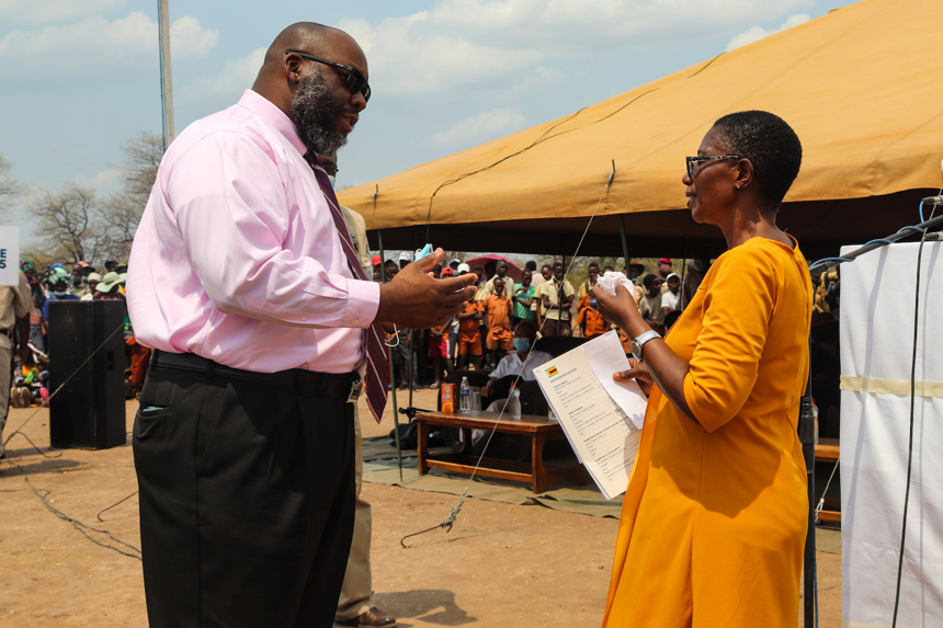 Art Brown, of the US Embassy Harare, speaks with Monica Mavhunga, Minister for Provincial Affairs