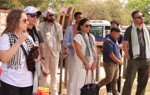 US Congressional staffers stand outside with Cambodian HALO staff