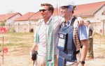 Two US Congressional staffers pose with PPE