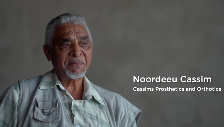 Noordeeu, from Cassims prosthetics speaks in a piece to camera