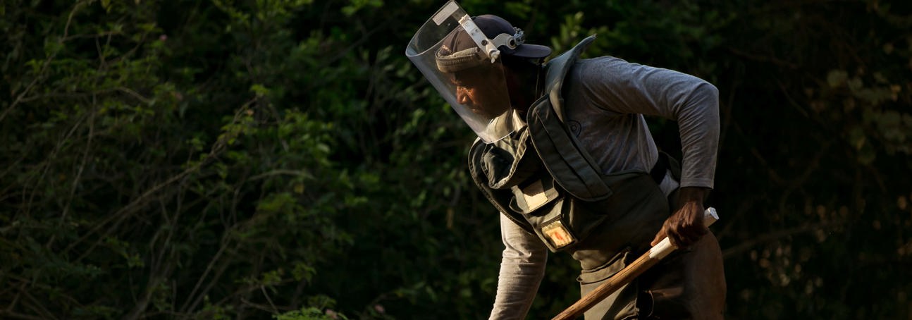 HALO worker wearing a protective vest and visor