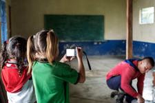 Classmates in Mesones taking photos of each other