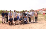 US Congressional staffers pose outside with Cambodian HALO staff