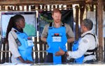 Prince Harry talking to local HALO staff