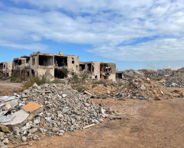 A destroyed building surrounded by rubble in Sirte, Libya