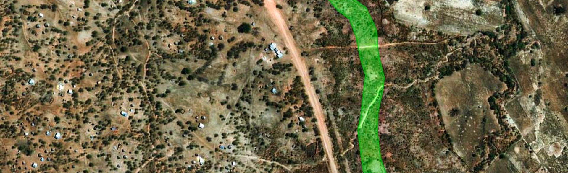 Satellite image highlighting a footpath running through a minefield