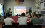 US Congressional staffers sit in front of a projector for HALO's Cambodian programme brief
