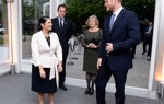 Former Secretary of State for International Development, Priti Patel talks with Prince Harry