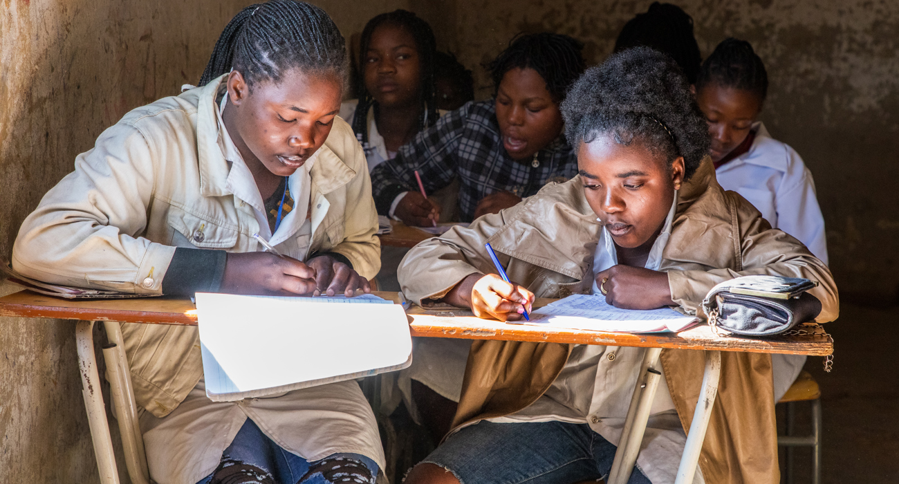 Students working in a classroom in Princess Diana School, Huambo