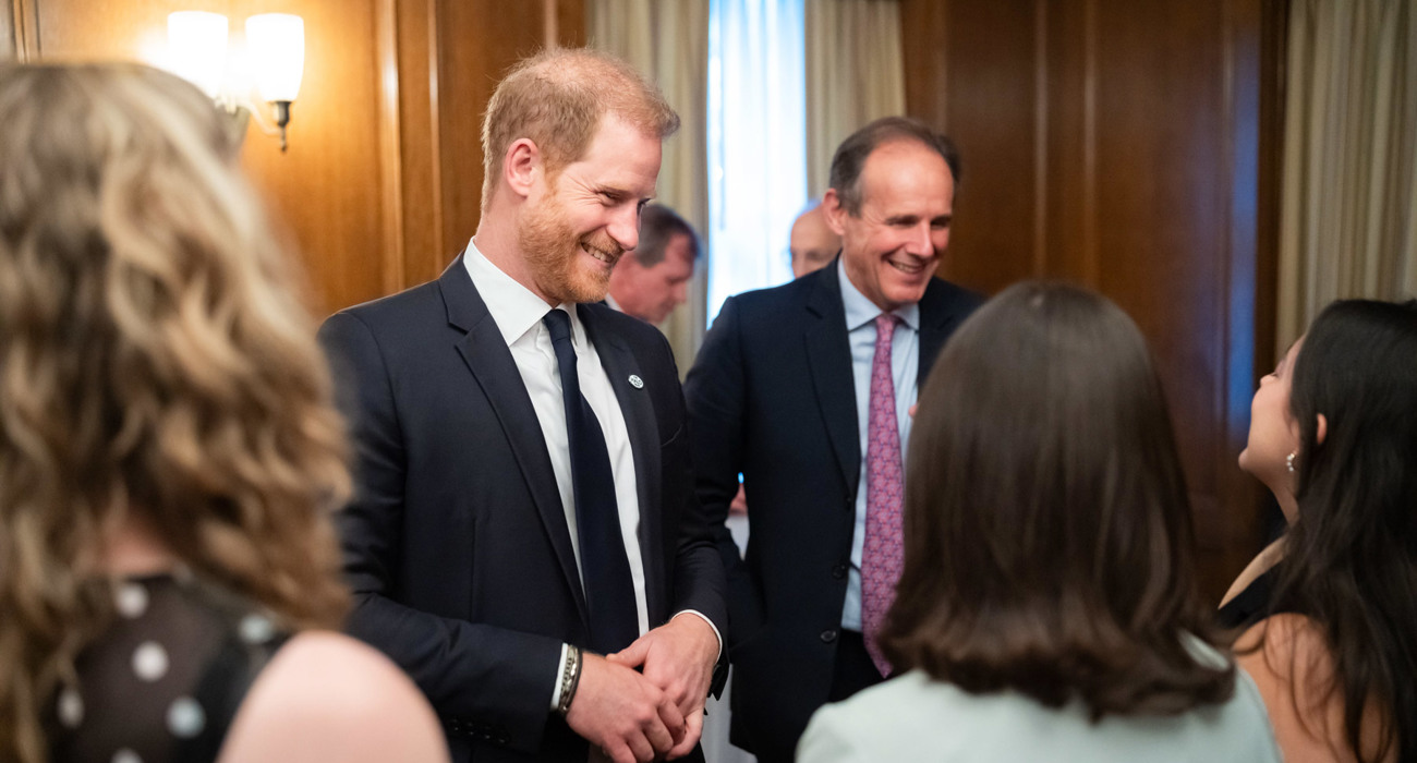 Prince Harry and HALO Trust CEO James Cowan smile whilst talking with guests at the UN HALO Trust Event