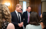 Prince Harry and HALO Trust CEO James Cowan smile whilst talking with guests at the UN HALO Trust Event