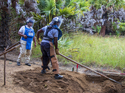 Task commander Thilay, uses a rake on the soil