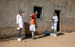 A group of smiling young men at Princess Diana School in Huambo 