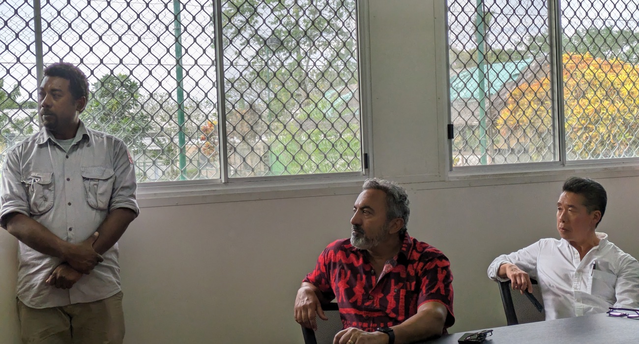Representative Ami Bera sits with colleagues in a meeting