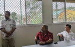 Representative Ami Bera sits with colleagues in a meeting