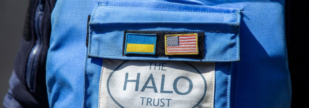 A close up of the HALO trust badge and US flag on a HALO protective vest