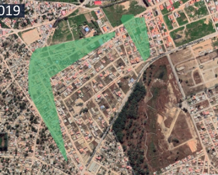 A satellite image taken in 2019 highlighting housing and infrastructure built on former minefields in Huambo