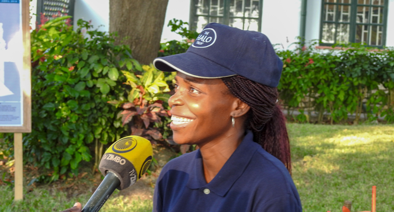 Suzana Soares, HALO Trust deminer and supervisor, giving a media interview during the bp Angola grant signing ceremony in Luanda