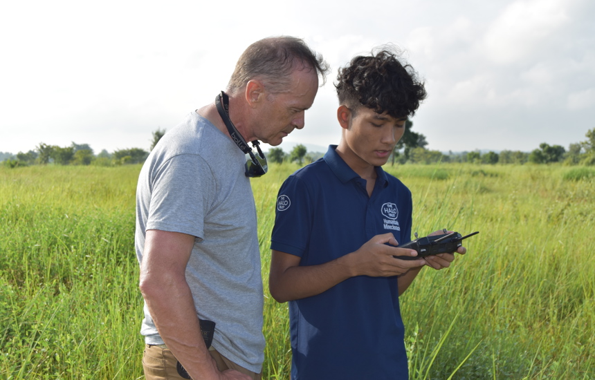 Two HALO staff members at work in Cambodia