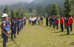 Cambodian deminers stand in line outside to welcome governments from the Netherlands, Canada and the United States