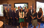 Group of people at a UXO caucus event