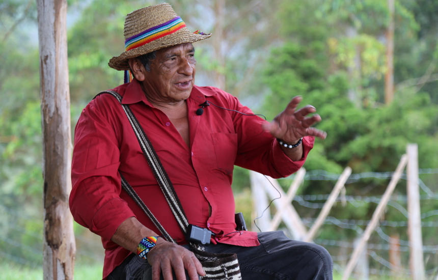 Luis Ángel, an Elder from Kwet Wala Indigenous Reservation talks while sitting down outside